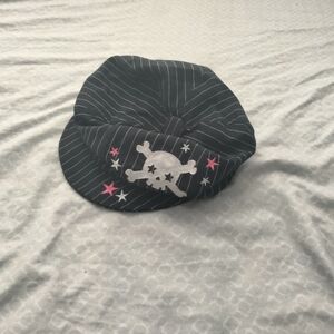 Black and White Striped Hat with Skull Design